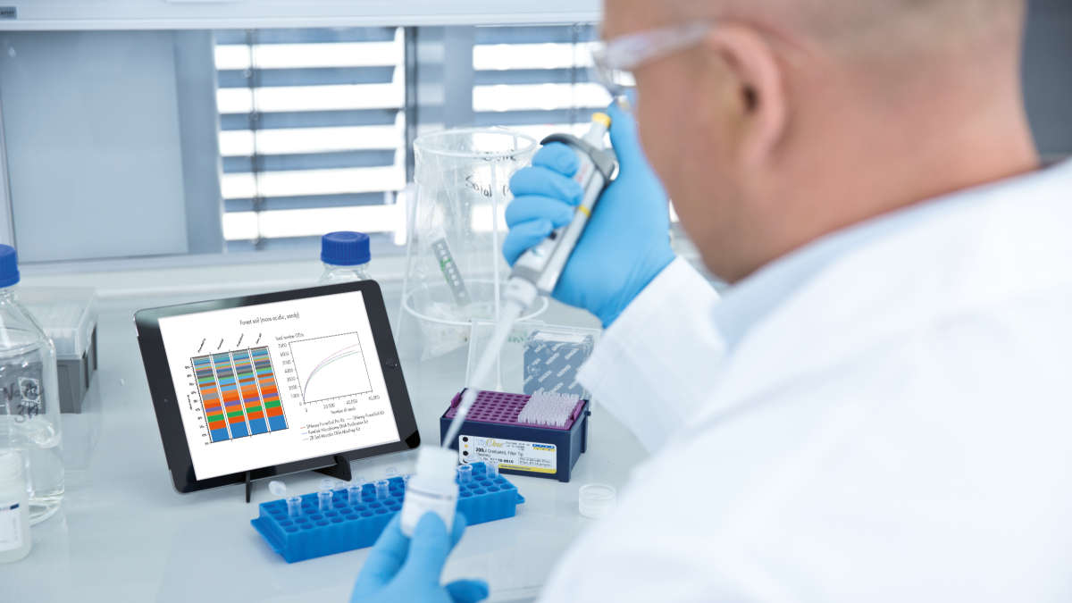iPad with data screen, microbiome, lab scientist